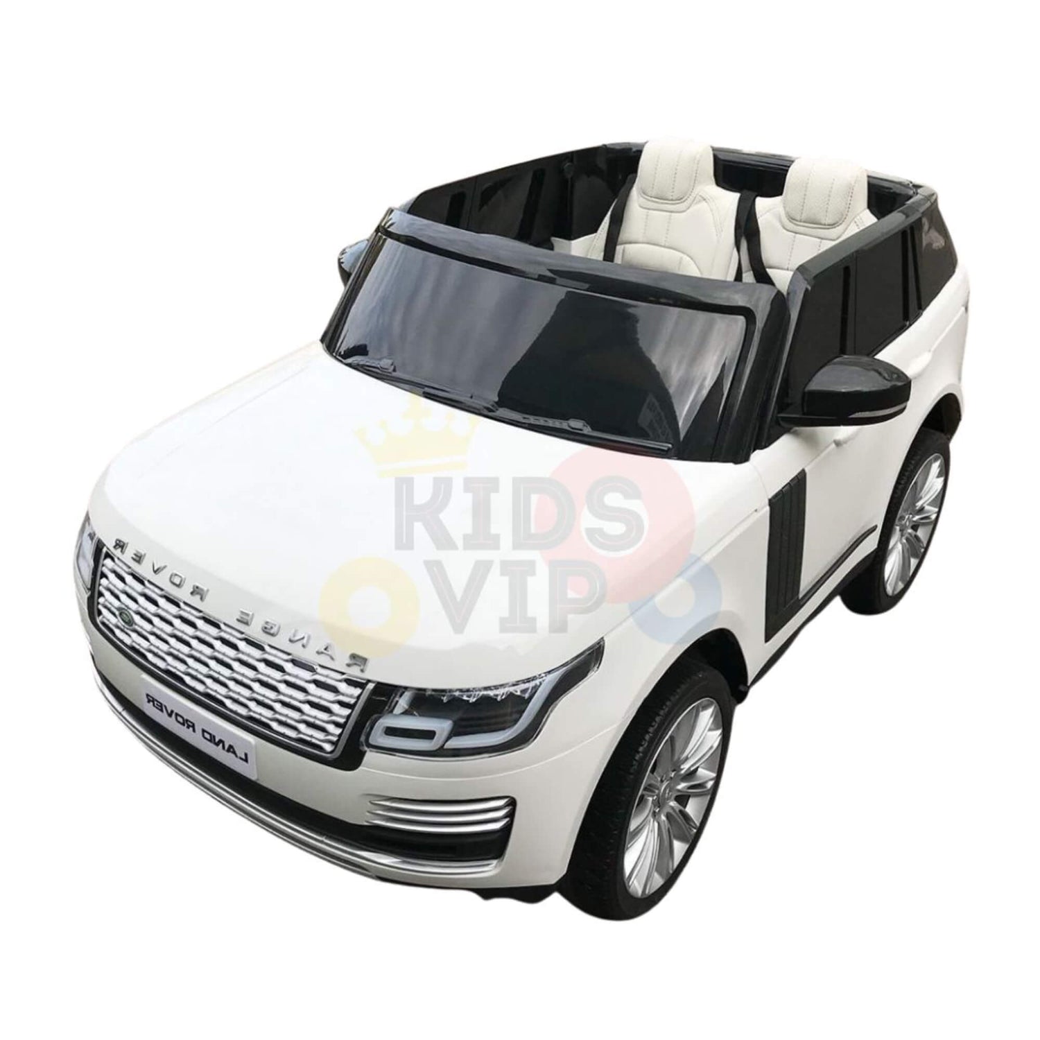 The 24V White on White Edition Range Rover Kids Ride On Car boasts luxury with its white body, black interior, silver detailing, and realistic wheels. Featuring two seats and ride-on technology, it includes a shiny grille and subtle Kids VIP watermark.