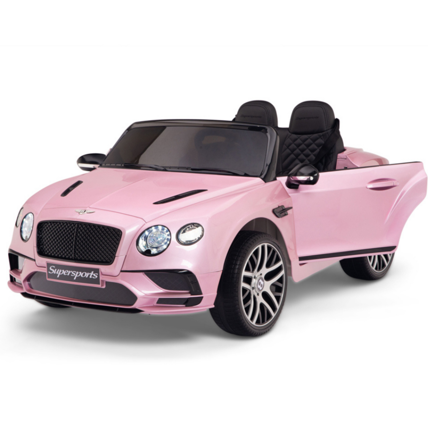 The Pink 12V Bentley GTC Kids Licensed Ride On Car features realistic details like working headlights, a quilted black interior, an open drivers door, and a Supersports license plate, along with rubber wheels and a parental remote control for enhanced safety.