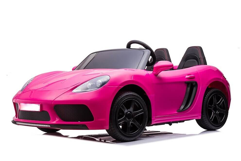 A bright pink ride-on convertible car, featuring sleek black wheels and two seats, is angled against a white background. Ideal as a replacement or upgrade with the Hood for 24v/180w XXL Super Ride.
