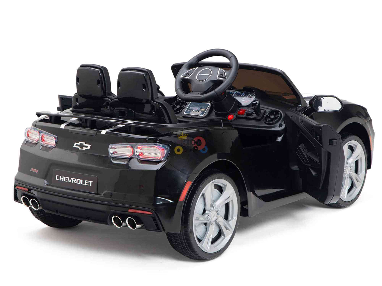 The Black Official Sport 12V Chevrolet Camaro Kids and Toddlers Ride on Car features an open drivers door, detailed interior, steering wheel, dashboard, dual exhaust, silver rims, ECO Leather Seats, and Eva Rubber Wheels for a smooth ride. Its set against a white background.