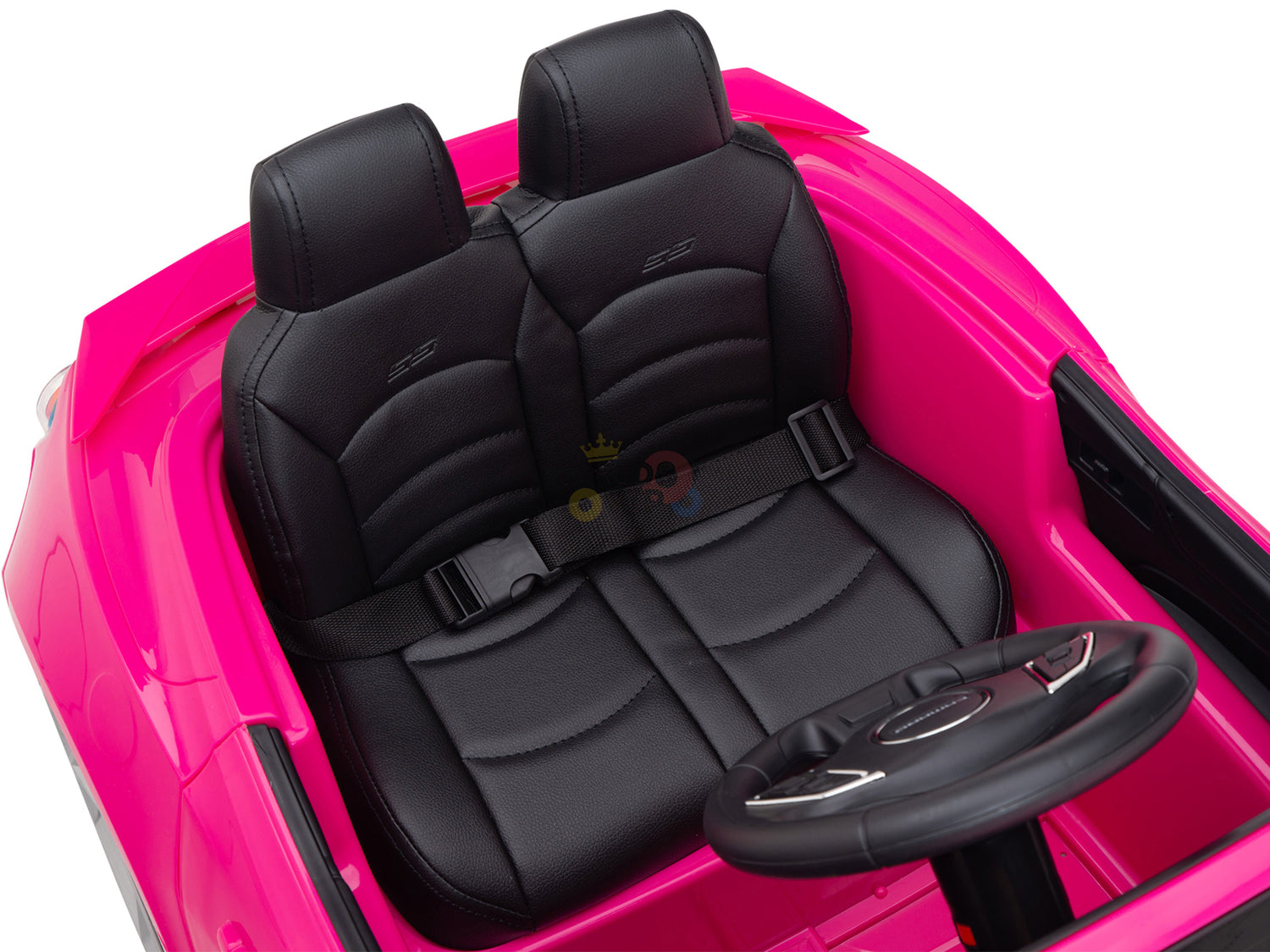 The Pink 12V Official Sport Chevrolet Camaro Kids Ride on Car features two black leather seats with seatbelts and a detailed steering wheel, making it ideal for imaginative play.