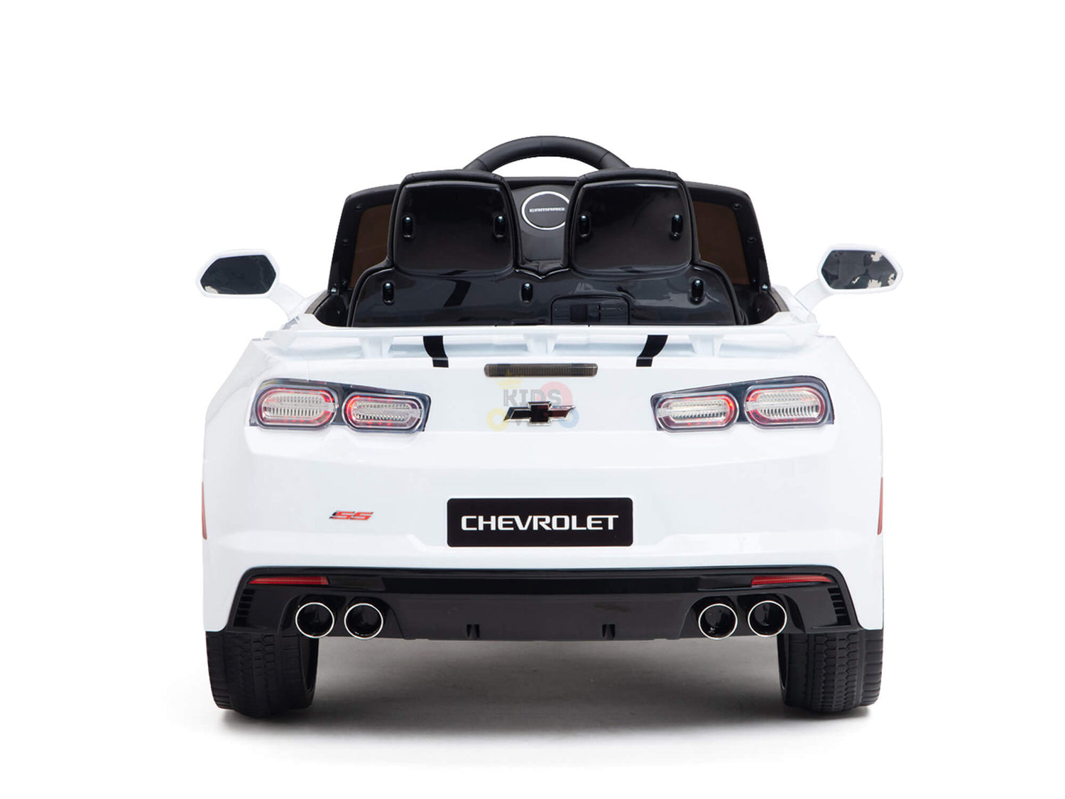 Viewed from the rear, the White 12V Official Sport Chevrolet Camaro Kids and Toddlers Ride on Car mimics a toy Camaro with dual exhausts, rear lights, side mirrors, sleek black interior, and a Chevrolet logo. It offers an exciting ride for kids with its Remote Control Ride-on feature.