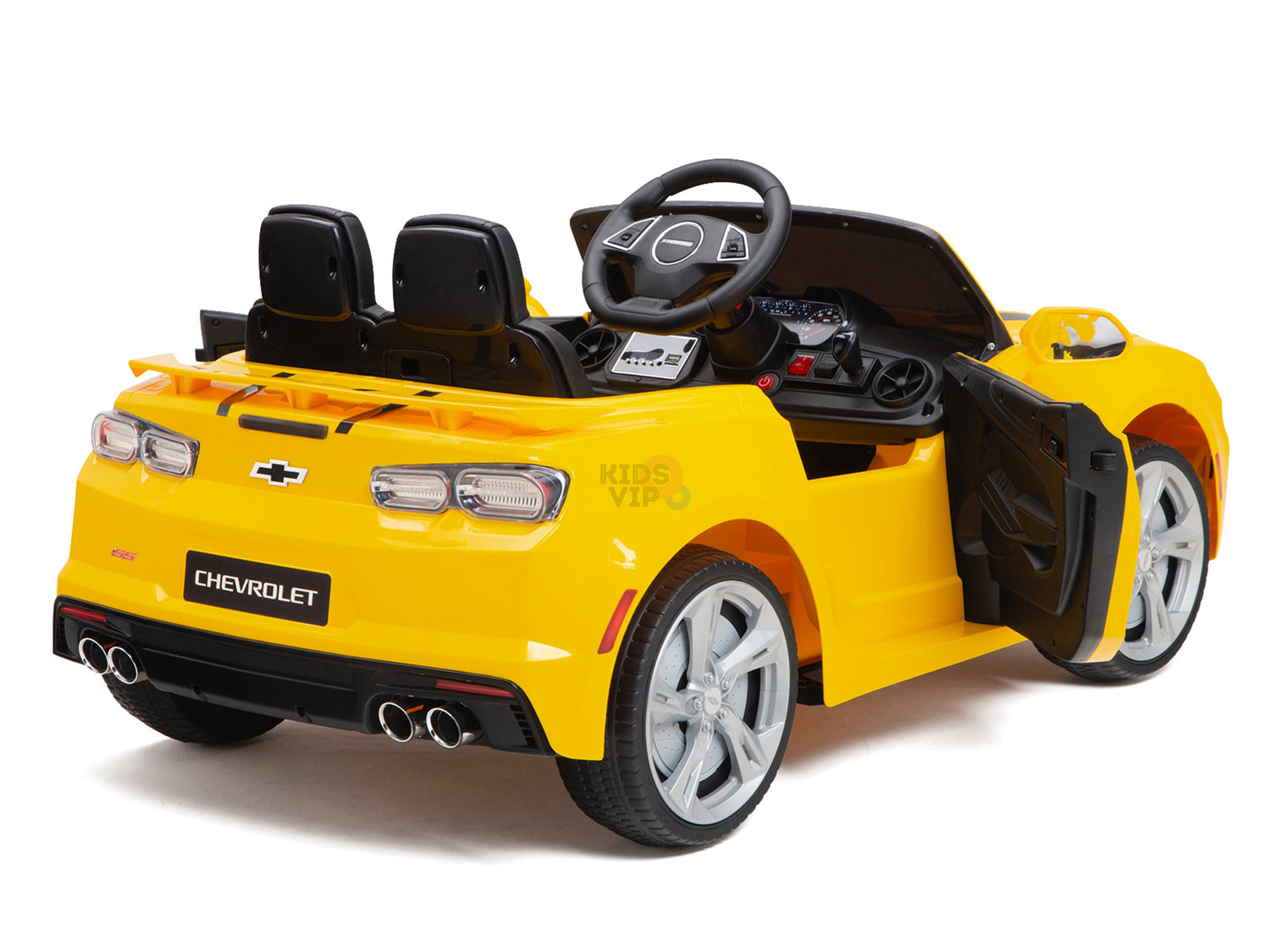 The Yellow 12V Official Sport Chevrolet Camaro Kids Ride-On Car features two seats, a black steering wheel, an open drivers side door, a detailed dashboard, dual exhaust pipes, and the iconic logo on the rear. It includes parental remote control for ultimate fun and safety.