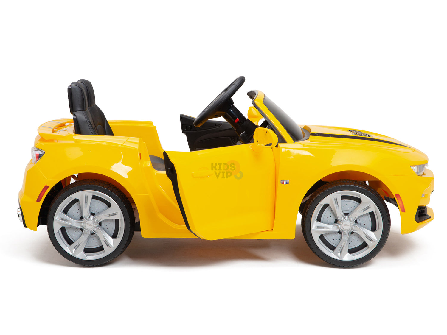 The Yellow 12V Official Sport Chevrolet Camaro Kids Ride-on Car features a side view with black seats, silver wheels, an open door, and a steering wheel. It includes a parental remote for extra control.