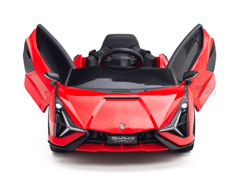 The Red Official 12V Sport Edition Lamborghini Sian Kids Ride On Car showcases butterfly doors, a sleek design, black detailing on the steering wheel and sporty seat, angular headlights upfront, and a logo on the bumper.