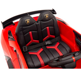 The Red 12V Lamborghini SVJ Sport Kids Ride On Car features black and red leather seats with logo-enhanced headrests, a visible dashboard, and steering wheel, all set in a bright red plastic exterior that embodies this sleek electric car.