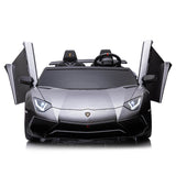 The Grey Giant Official Limited Edition Lamborghini SV 24V/180W features open scissor doors, illuminated headlights, black eco-leather two-seater seats, and a steering wheel. Designed for big kids, it offers a luxury ride-on toy experience with speeds up to 10MPH.