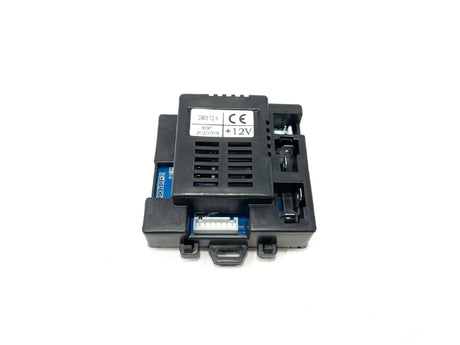 A black 12V Mercedes GLC Receiver Module for ride-on cars, featuring top vents, +12V specifications, and a CE safety symbol. Its designed to enhance vehicle performance with side connectors, captured against a plain white background.