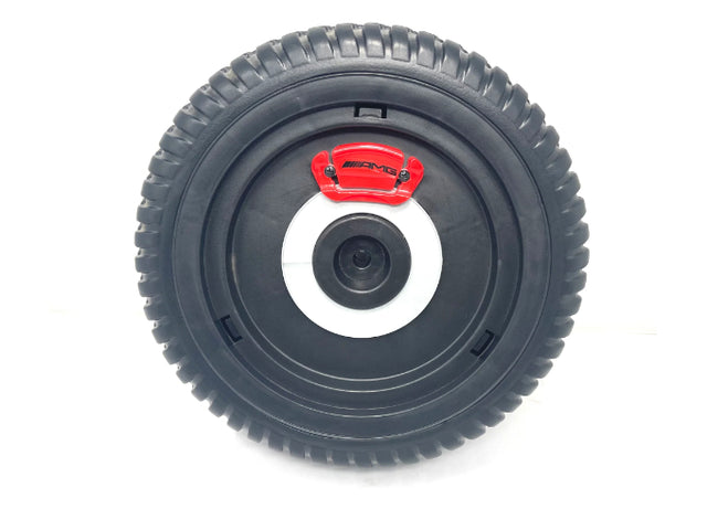 A close-up of a black rubber tire with a red handle, similar to the 12V Mercedes GLC Two Seater Wheel, displays its detailed tread pattern. This ride-on car wheel emphasizes performance and functionality on a white background.